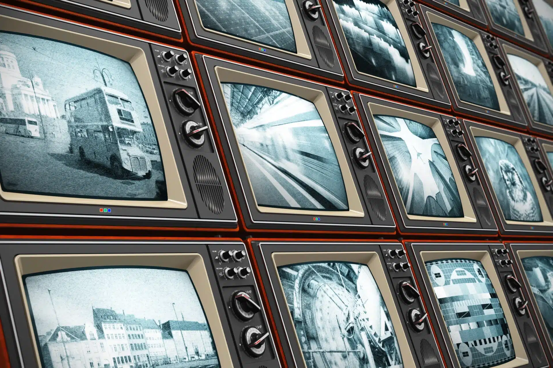 Grid of vintage television sets displaying various black and white images, symbolizing traditional media for political advertising and voter engagement.